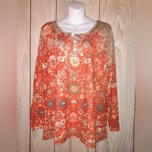 Pullover, long sleeve shirt with southwest pattern in rust. New without tags.